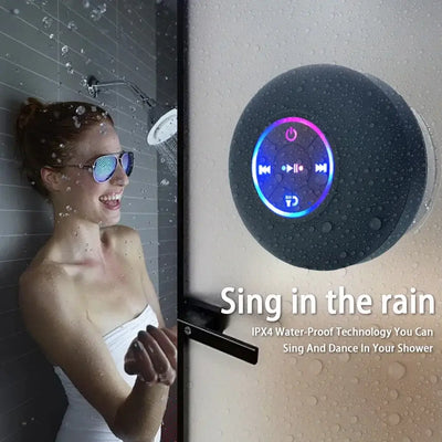 Waterproof Bluetooth speaker with LED light for shower fun.